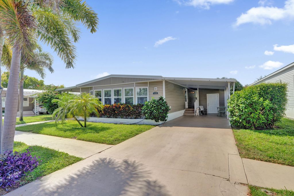 Photo of 120 NW 53rd Place, Pompano Beach, FL 33064 (MLS # B26018991)