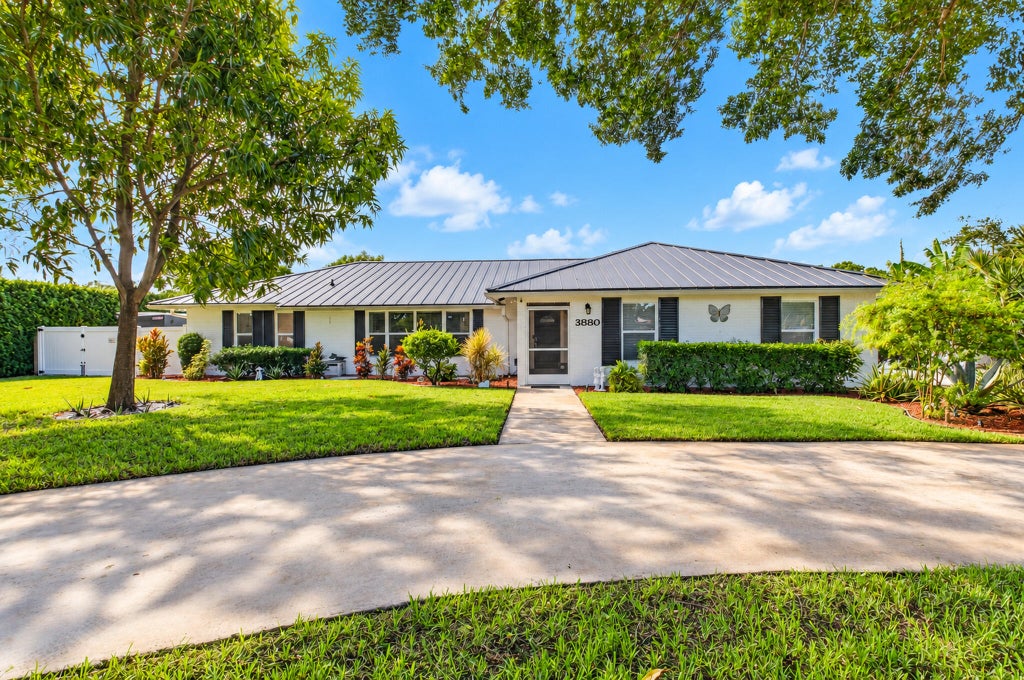 Photo of 3880 Lowson Boulevard, Delray Beach, FL 33445 (MLS # B26091641)