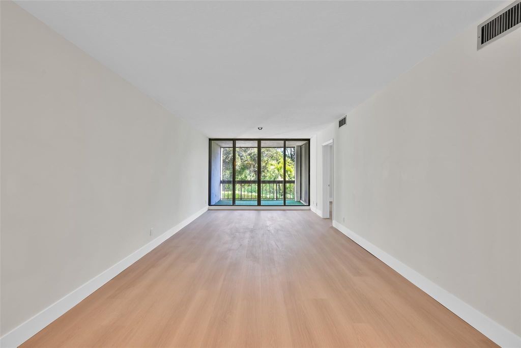 Photo of 8411 Forest Hills Drive #206, Coral Springs, FL 33065 (MLS # F10537876)