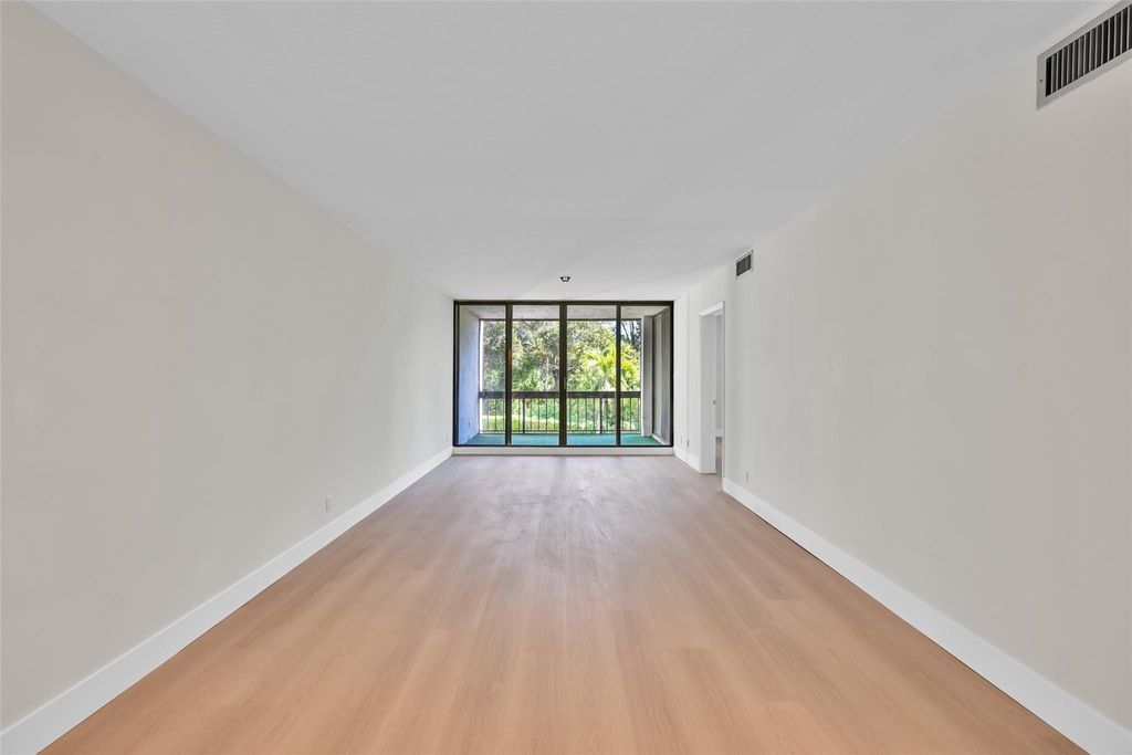 Photo of 8411 Forest Hills Dr #206, Coral Springs, FL 33065 (MLS # F10537876)