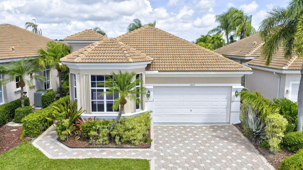 Photo of 6935 Fairway Lakes Drive, Boynton Beach, FL 33472 (MLS # B26012608)