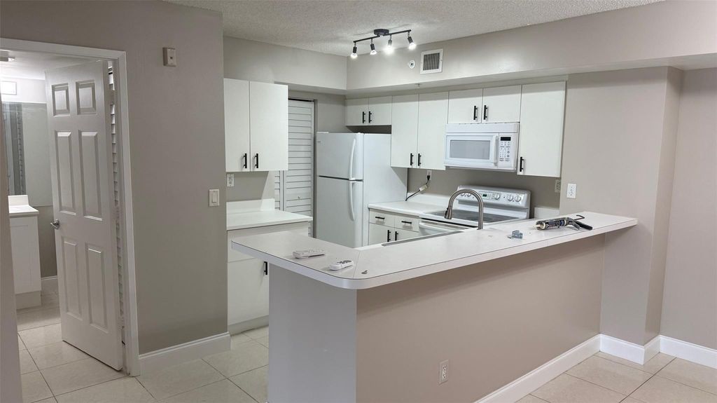 Photo of 2600 S University Drive #112, Davie, FL 33328 (MLS # F10521253)