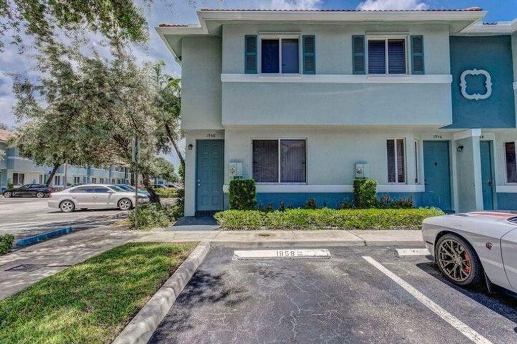 Photo of 1958 Hibiscus Lane, Riviera Beach, FL 33404 (MLS # R11131153)