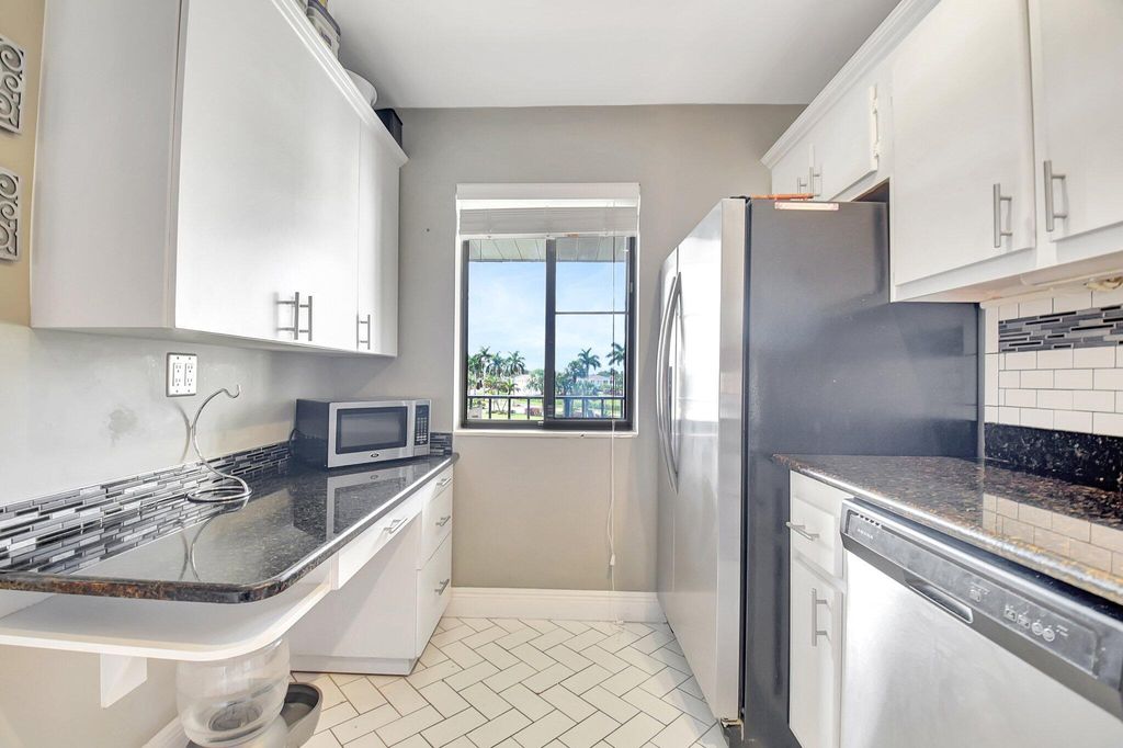 Photo of 4070 Tivoli Court #307, Lake Worth, FL 33467 (MLS # R11109514)