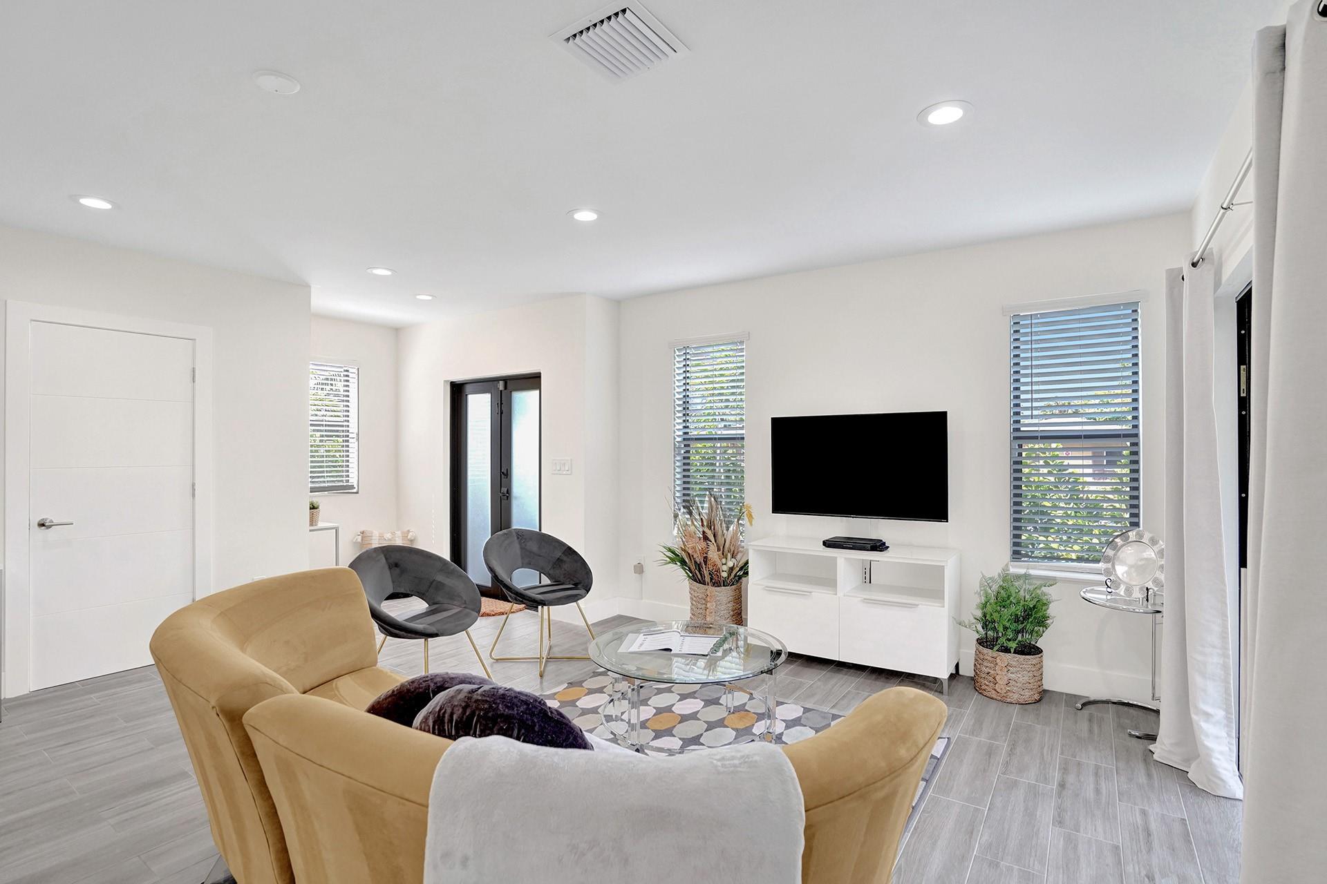 Beautifully updated 2021 build featuring 3 bedrooms, 2.5 baths! Two-story townhome - fully furnished & fully equipped. Property offers an open floor plan with modern finishes, private balconies, laundry room and 2 designated parking spaces. Close to shopping, dining, Las Olas and Fort Lauderdale Beach. Can be annual or 6+ months. EV charger included. ALL UTILITIES included - electric, water, trash/sewer, internet, pest control, and yard maintenance.