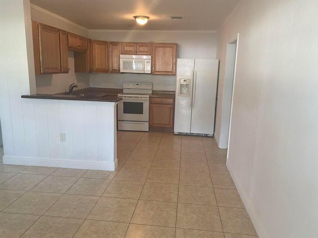 Photo of 3218 Mura Drive, Fort Pierce, FL 34982 (MLS # R10946915)