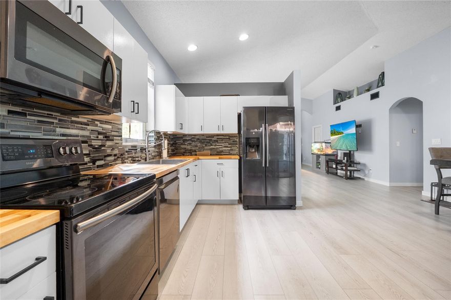 LOCATION LOCATION! MOTIVATED SELLER. 
This beautifully updated Corner townhouse offers a fresh, modern interior and an unbeatable location close to top-rated schools and vibrant entertainment options. The home features a contemporary design with sleek finishes, an open-concept layout. Generous living spaces include multiple bedrooms and bathrooms, perfect for families or professionals. Situated just minutes from shopping centers, dining establishments, and entertainment venues, the location ensures convenience and accessibility. Additional highlights include a private WRAPAROUND BACKYARD ideal for relaxation or entertaining guests, Full Size Car Garage that can be used for storage or for parking a full size SUV.