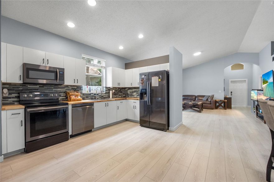 LOCATION LOCATION! MOTIVATED SELLER. 
This beautifully updated Corner townhouse offers a fresh, modern interior and an unbeatable location close to top-rated schools and vibrant entertainment options. The home features a contemporary design with sleek finishes, an open-concept layout. Generous living spaces include multiple bedrooms and bathrooms, perfect for families or professionals. Situated just minutes from shopping centers, dining establishments, and entertainment venues, the location ensures convenience and accessibility. Additional highlights include a private WRAPAROUND BACKYARD ideal for relaxation or entertaining guests, Full Size Car Garage that can be used for storage or for parking a full size SUV.