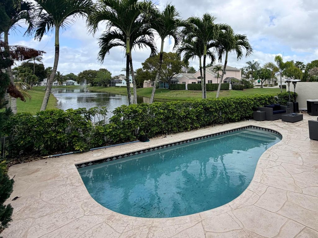 Photo of 7825 Travlers Tree Drive, Boca Raton, FL 33433 (MLS # B26008394)