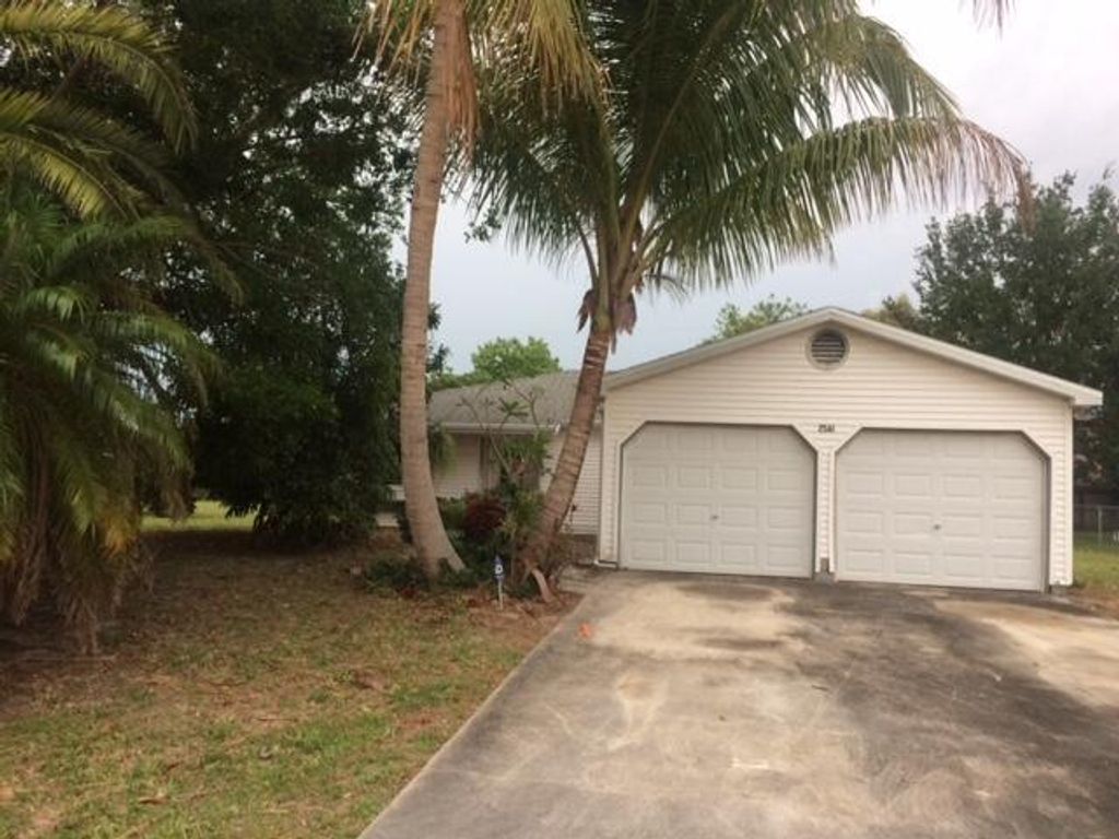 Photo of 2561 SE Victory Avenue, Port Saint Lucie, FL 34952 (MLS # R10709897)