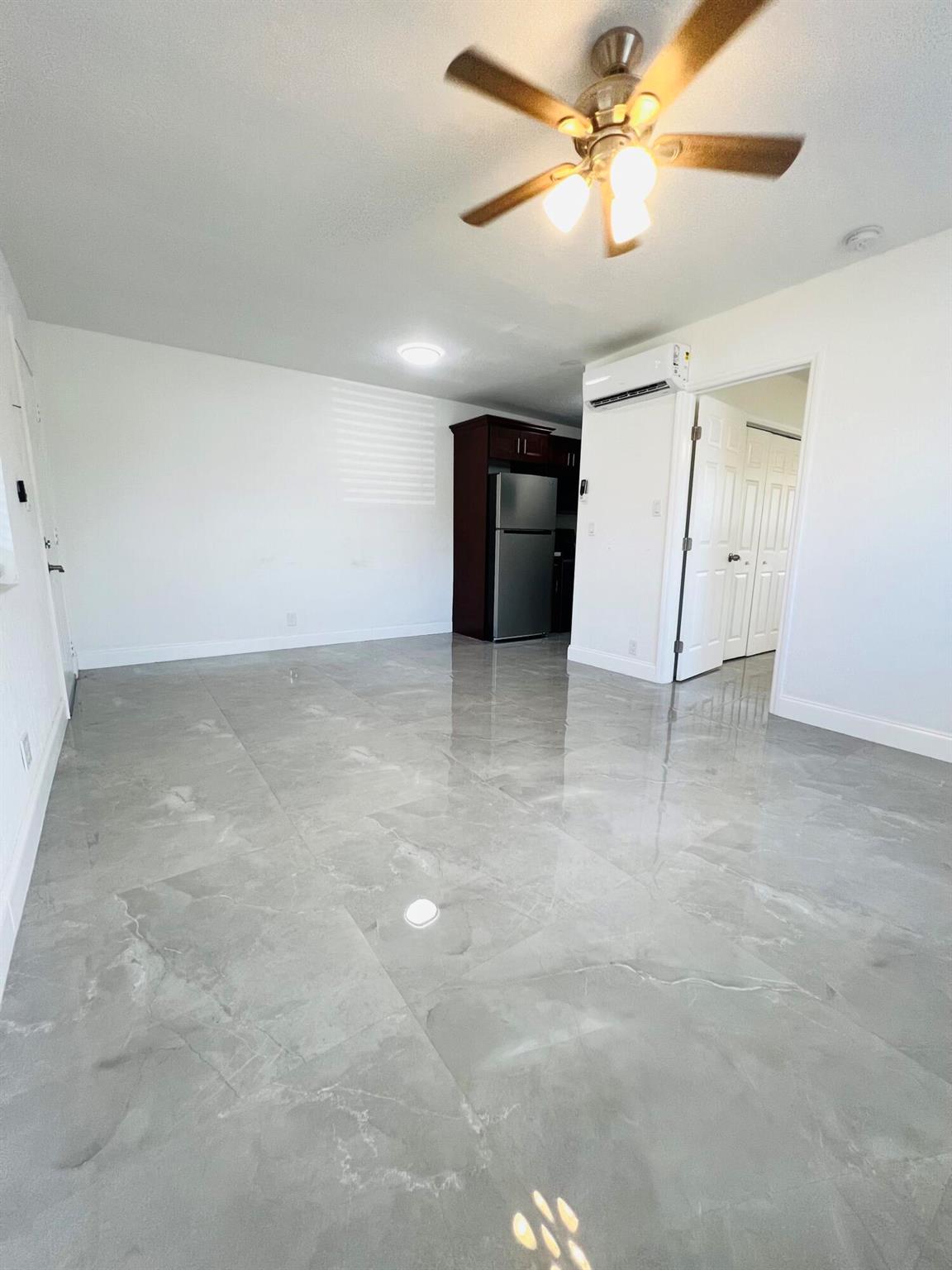 Welcome to your charming rental unit nestled in the heart of Margate just off 441 and Atlantic Blvd. This cozy 1 bedroom/1 bathroom corner unit offers the perfect blend of comfort and convenience. Fully remodeled to suit modern tastes, it features impact windows, marble floors, quartz countertops and stainless-steel appliances. Plus, enjoy coin laundry access and 2 designated parking spaces. Get approved quickly and take advantage of easy living without any HOA hassle! Schedule your private viewing today.