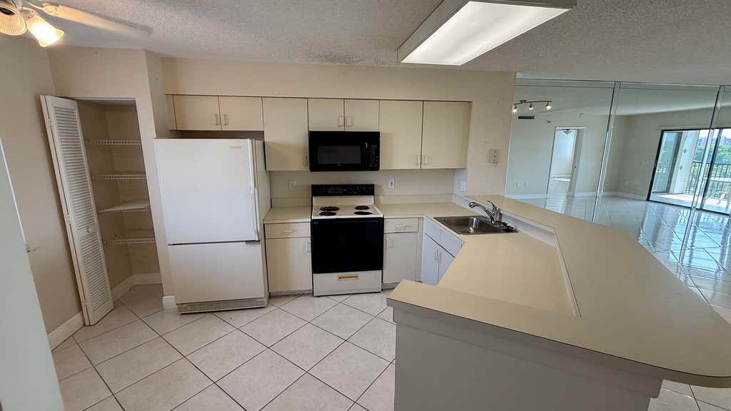 Photo of 2334 S Cypress Bend Drive #802, Pompano Beach, FL 33069 (MLS # B26054543)