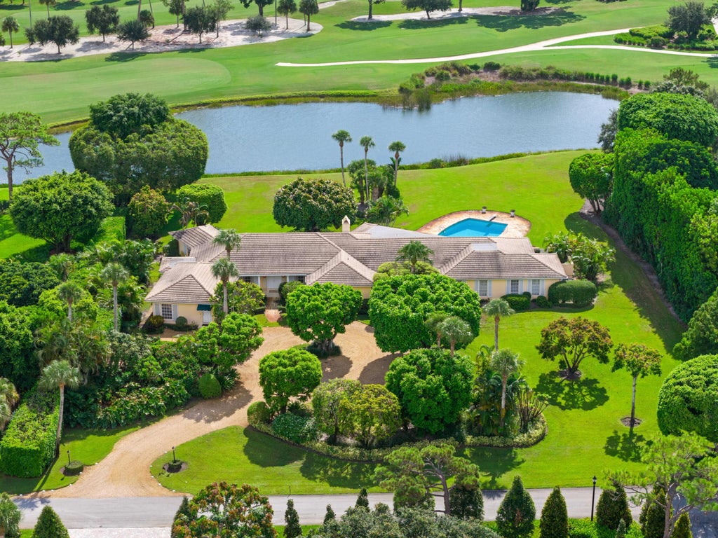 Photo of 8 COUNTRY Road W, Boynton Beach, FL 33436 (MLS # B26073530)
