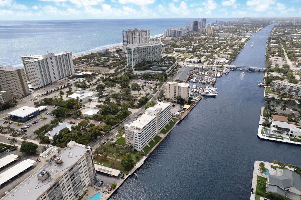 Photo of 201 N Riverside Drive #402, Pompano Beach, FL 33062 (MLS # B26011470)