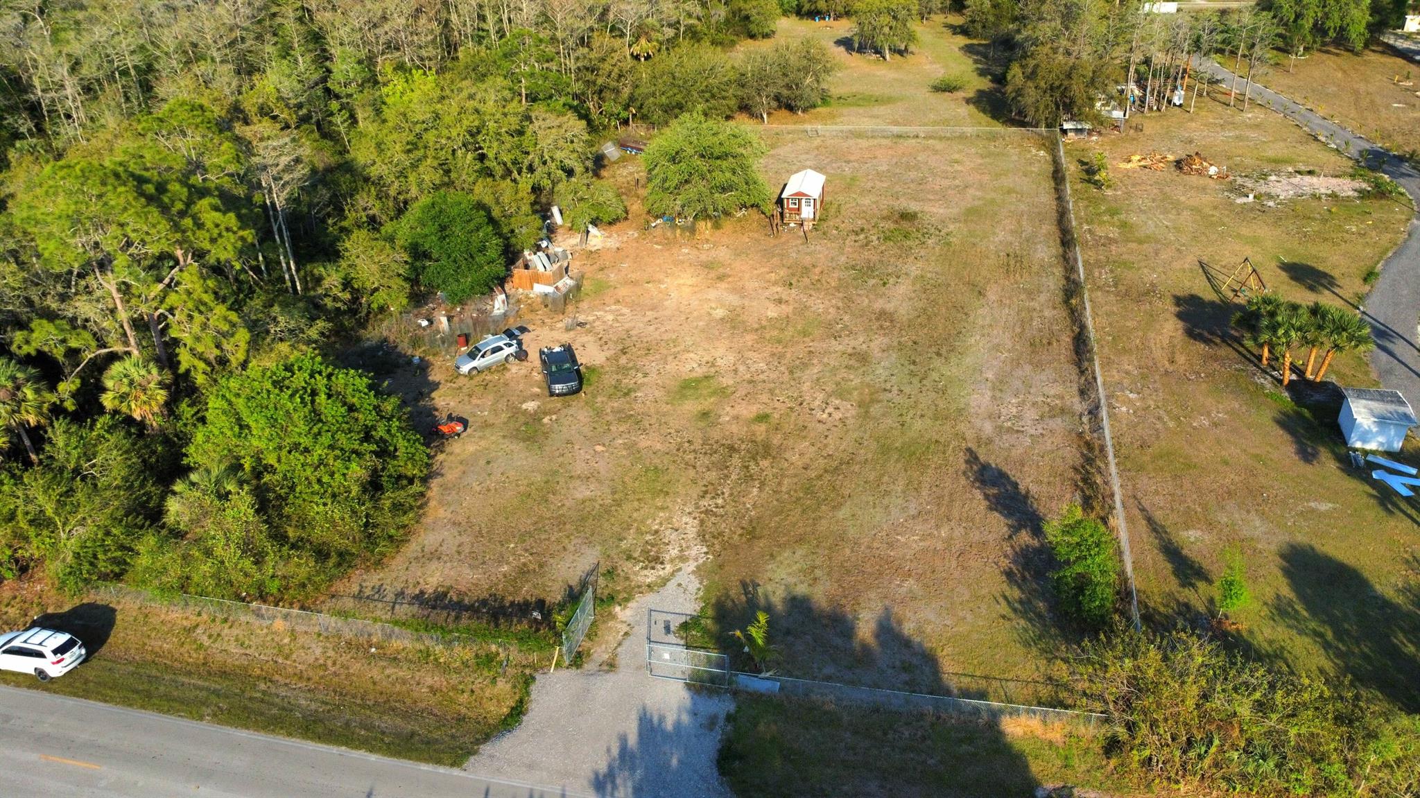 Welcome to Montura Ranches! This prime 1.25-acre parcel, ideally located along the main road, offers one of the best locations in the community. The property is fully fenced, features a newly covered entrance, and includes a functional well ready for your dream ranch. With easy access to major cities, this lot provides the perfect balance of privacy, security, and convenience. Not a wetland, and with no existing structures, it offers a blank canvas to build your ideal retreat. Don't miss this exceptional opportunity to own a piece of Montura's natural beauty!Shed is not included. This property is being sold strictly as vacant land. Buyers are advised to verify all future use or development plans with Hendry County Zoning and Building Department.