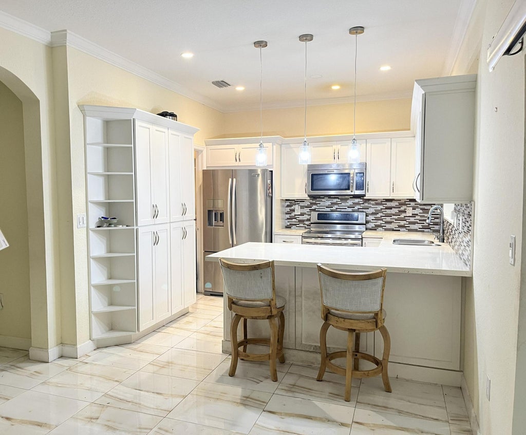 Photo of 5003 SW 135TH Way #5003, Miramar, FL 33027 (MLS # B26053935)