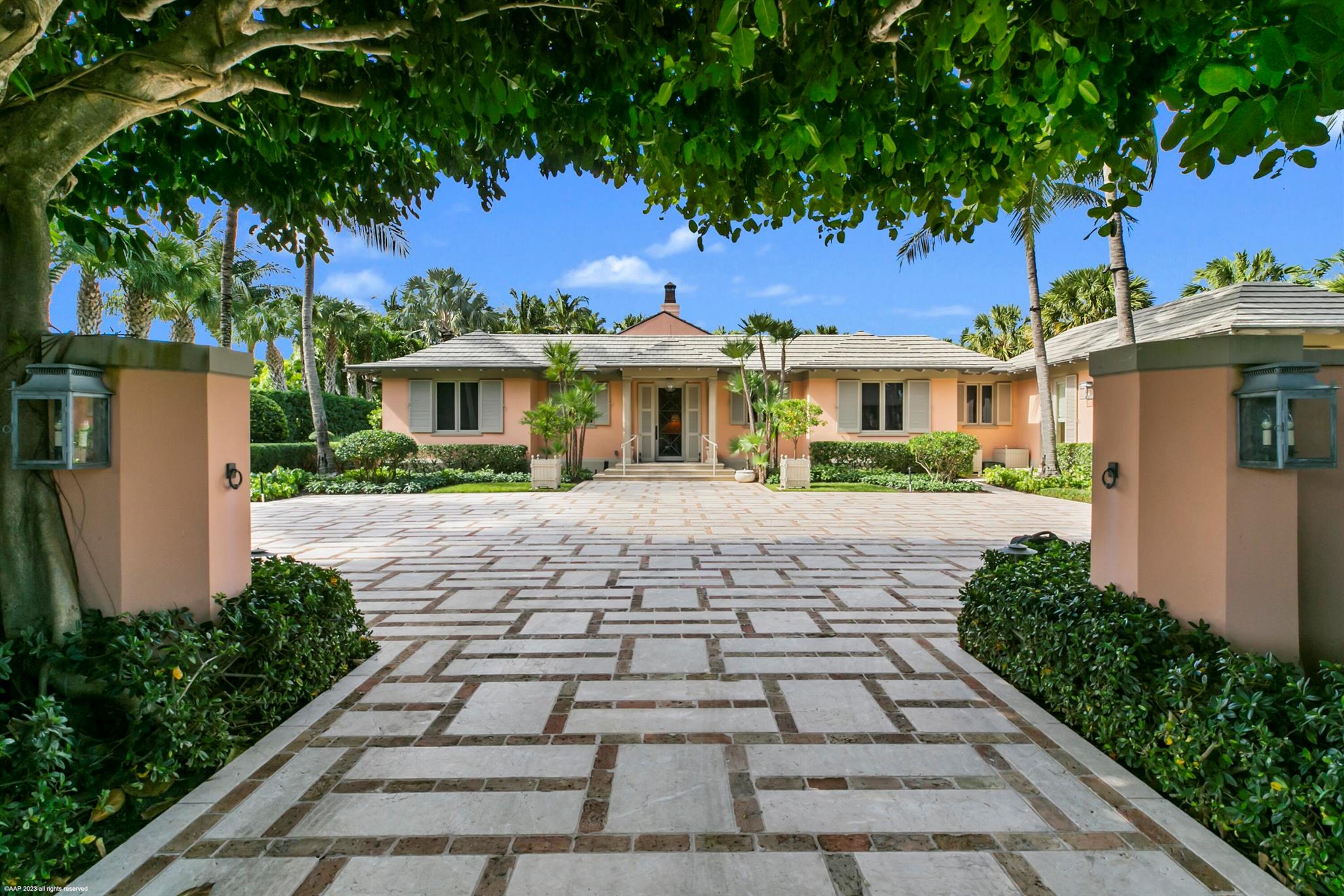 Renovated in 2002, this glorious five bedroom house located in the heart of Jupiter Island offers the best in gracious and elegant living. Expansive entertaining spaces both inside and out allow for large parties or multi generational living during holidays and vacations. Each design element has been carefully considered from the heated towel bars and Guerin/Waterworks in each of the bathrooms to the Venetian plaster, trompe l'oeil and cypress walls throughout. The meticulously maintained, verdant gardens with Versailles planters surrounding the pool and fountains create a serene and lush oasis