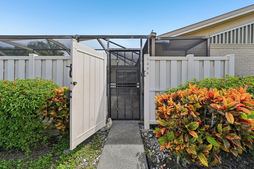 Welcome home to this beautiful 3BR, 2Bth villa, a true gem in the desirable, amenity rich community of Westwood Gardens.This home combines updated interior features with exceptional private outdoor living. Step inside an open floor plan bathed in natural light, featuring vaulted ceilings and durable plank flooring. The spacious, private courtyard is a perfect extension of your home, featuring a gazebo, outdoor electric, storage shed, nicely landscaped border all screened enclosed for outdoor comfort.Enjoy ultimate peace of mind knowing the major expenses are covered: updated kitchen, metal roof 2015 and Ruud A/C 2015. Polybutylene piping replaced 2025! Full hurricane protection on every window. Newer appliances.Come discover easy, peace of mind living, in Westwood Gardens