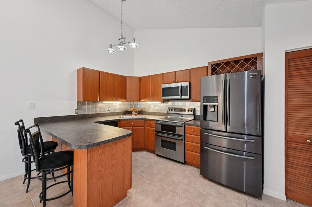 Photo of 5448 Eagle Lake Drive, Palm Beach Gardens, FL 33418 (MLS # R11128024)