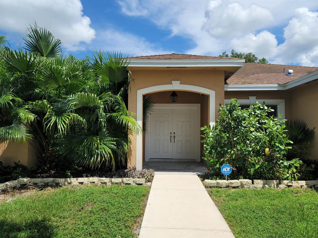 Photo of 3237 SW Rosser Boulevard, Port Saint Lucie, FL 34953 (MLS # R11013566)