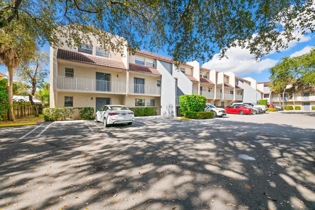 Photo of 3750 NW 115th Way #9-1, Coral Springs, FL 33065 (MLS # R11153761)