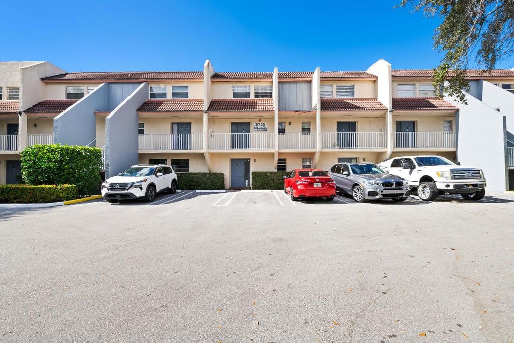 Photo of 3750 NW 115th Way #9-1, Coral Springs, FL 33065 (MLS # R11153761)