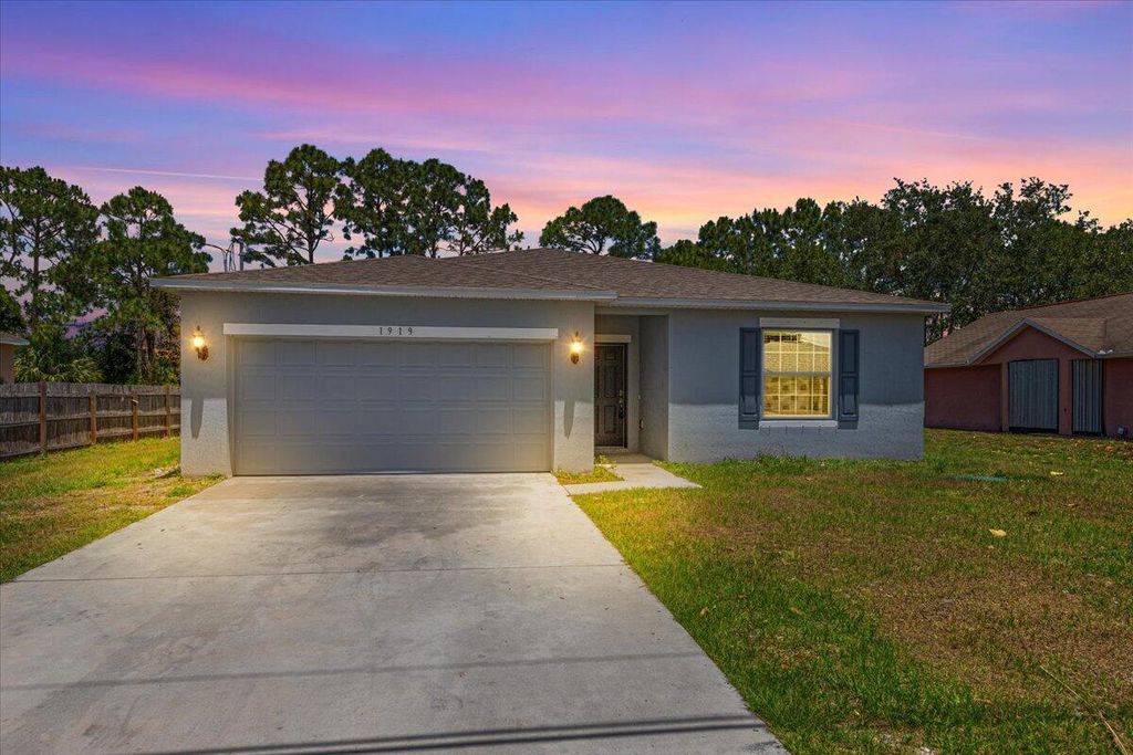 Photo of 1919 SW Fears Avenue, Port Saint Lucie, FL 34953 (MLS # R10985433)