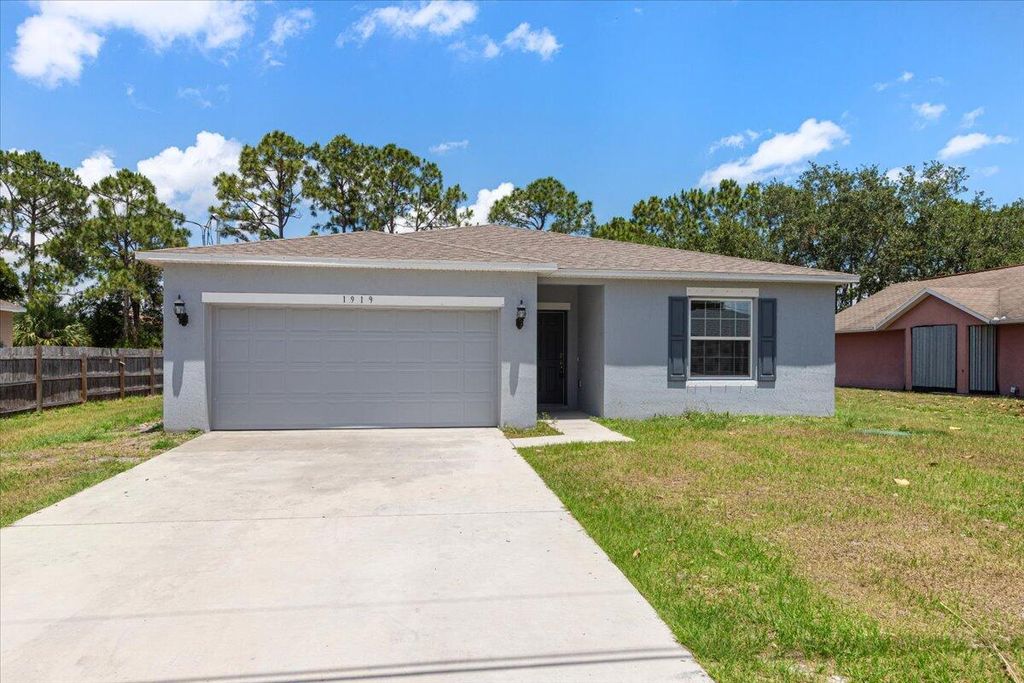 Photo of 1919 SW Fears Avenue, Port Saint Lucie, FL 34953 (MLS # R10985433)