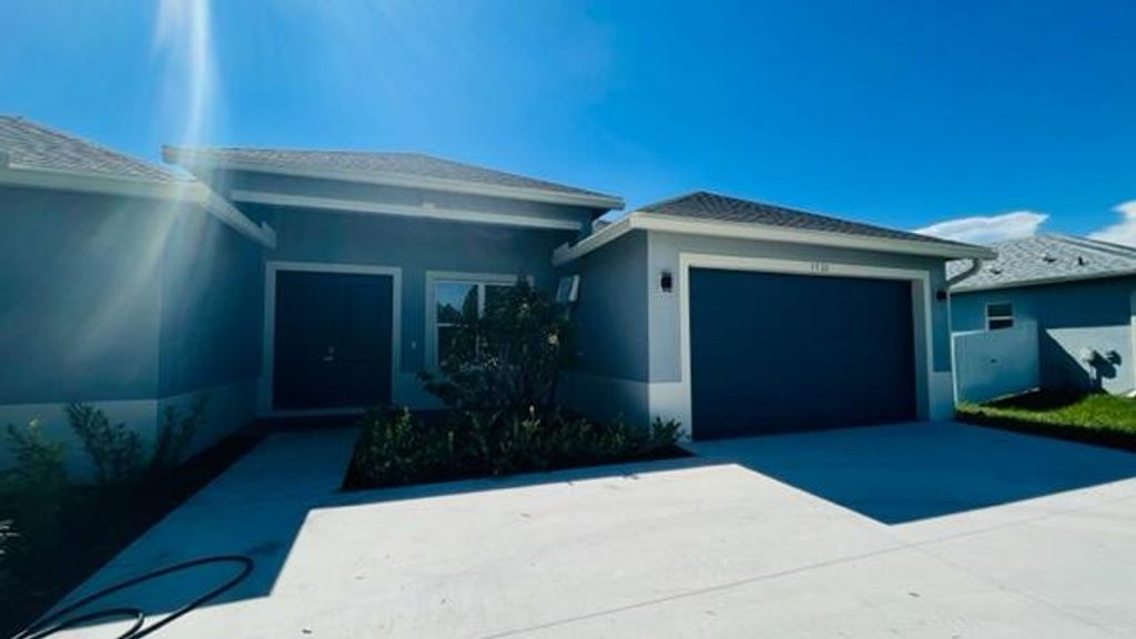 Photo of 1726 SW California Boulevard, Port Saint Lucie, FL 34953 (MLS # R10943921)