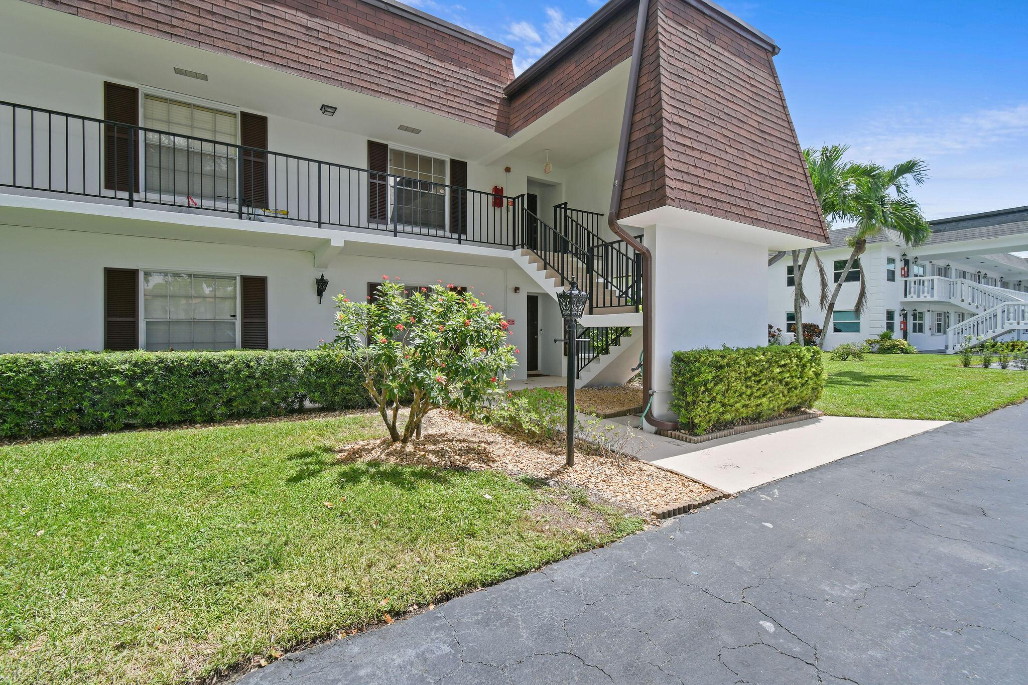 Step into comfort and style with this beautifully updated residence! Featuring a private corner entry and serene tree-top views, this home blends elegance and functionality. The renovated kitchen and baths shine with modern finishes, while crown molding and tasteful updates add a touch of sophistication, & plenty of storage. The perfect home for relaxing and entertaining with a blend of lifestyle and value. Located in a friendly 55+ community offering, pool, club house, billiards table, & many activities. It is walkable to Promenade Plaza, many restaurants, Newest Publix, Planet Fitness. and a short drive to Beaches, Airport and Medical Centers.