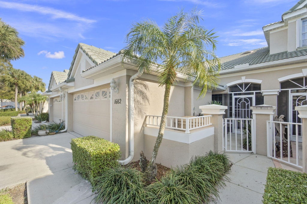 Photo of 1682 SW Harbour Isles Circle, Port Saint Lucie, FL 34986 (MLS # R10970485)