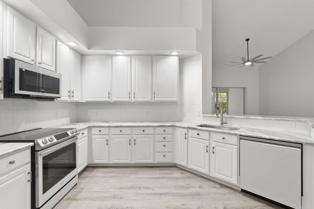 Photo of 1682 SW Harbour Isles Circle, Port Saint Lucie, FL 34986 (MLS # R10970485)