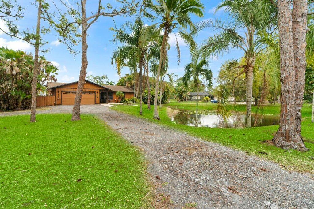 Photo of 4900 122nd Drive N, Royal Palm Beach, FL 33411 (MLS # R11071114)