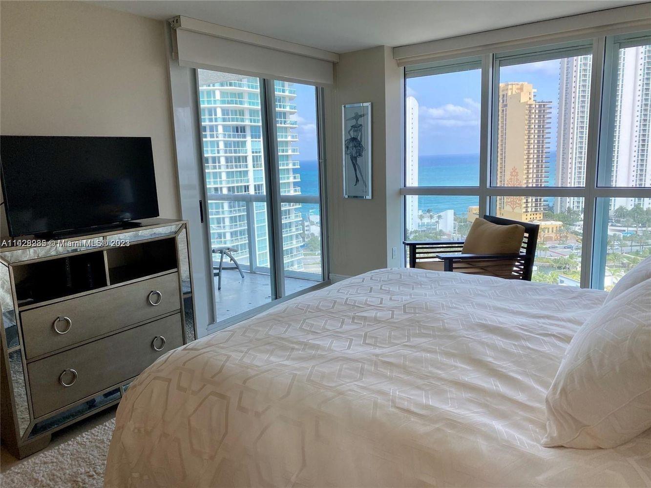 Experience luxury living at its finest in this stunning 20th-floor residence at Oceania V, located on a private island in the heart of Sunny Isles Beach. This fully furnished 2-bedroom, 2-bathroom condo with a den/office offers over 1,760 square feet of elegant living space, complemented by a spacious southeast-facing balcony that provides extraordinary ocean and Intracoastal views.