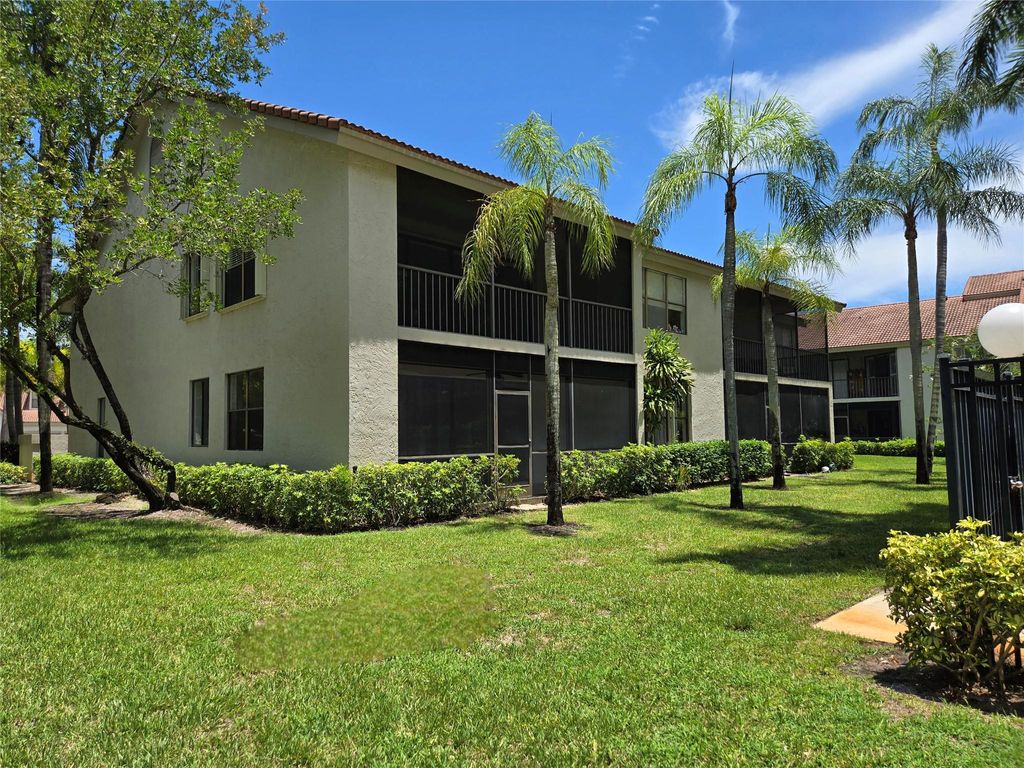 Photo of 5800 Coach House Cir #D, Boca Raton, FL 33486 (MLS # F10518827)