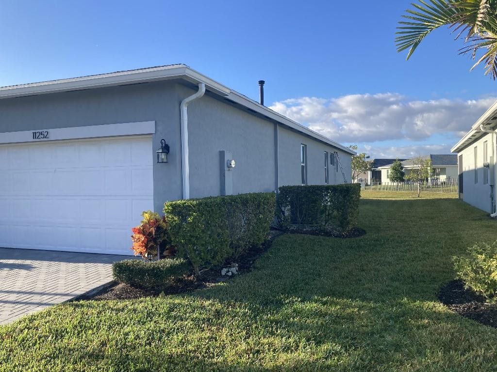 Photo of 11252 SW Lyra Drive, Port Saint Lucie, FL 34987 (MLS # F10551354)