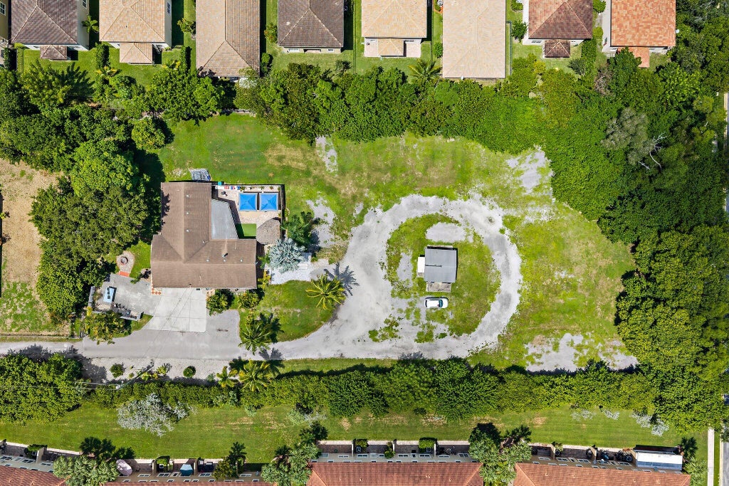 Photo of 5681 Desoto Road, Greenacres, FL 33463 (MLS # B26070100)