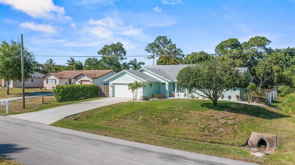 Photo of 661 SE Delancey Lane, Port Saint Lucie, FL 34984 (MLS # F10498221)
