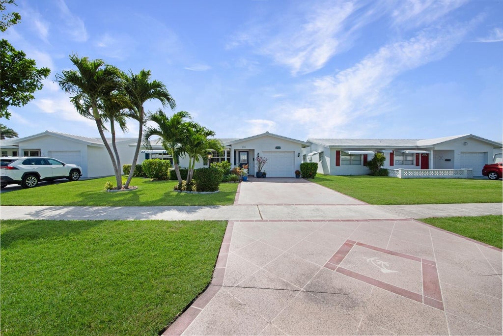 Photo of 1311 SW 18th Street, Boynton Beach, FL 33426 (MLS # R11078599)