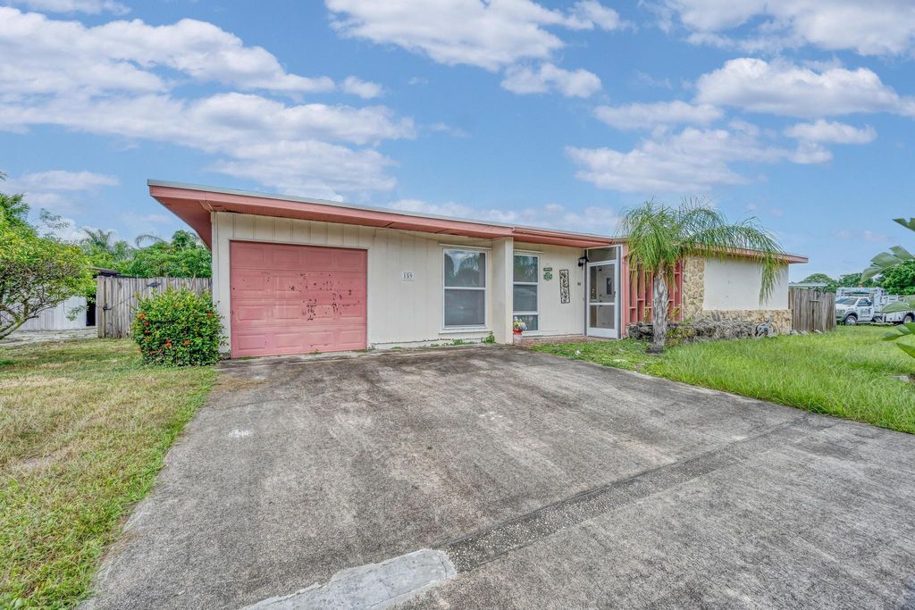 Photo of 159 NE Lobster Road, Port Saint Lucie, FL 34983 (MLS # R11113213)
