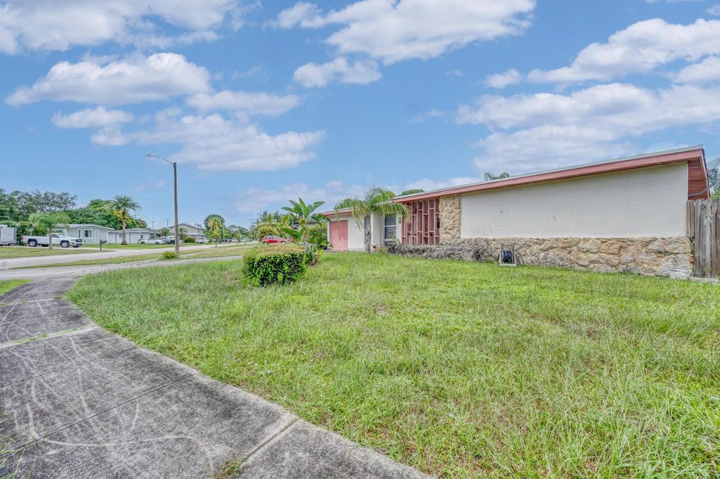 Photo of 159 NE Lobster Road, Port Saint Lucie, FL 34983 (MLS # R11113213)