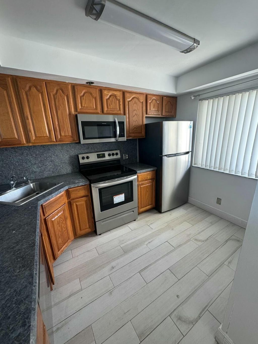 Photo of 3000 Presidential Way #404, West Palm Beach, FL 33401 (MLS # B26027235)
