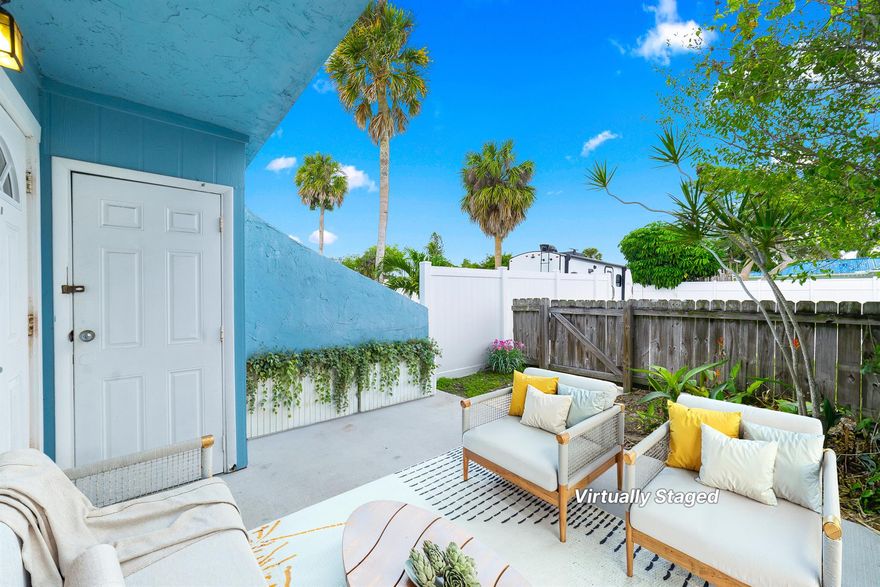 Rare Find, No HOA, minutes distance to the beach! Experience the Florida beach lifestyle in this charming two-story townhouse located in the Coral Cove Beach community, just fives minutes to the ocean. With no HOA fees, this property is ideal as a vacation home or a potential Airbnb. Enjoy the serene setting with a state park right across the street, perfect for nature lovers. Kayak rentals are nearby for your afternoon adventures. The townhouse features two bedrooms, 1.5 baths, and a private open patio. The kitchen boasts granite countertops and a full appliance package, including a full-size washer and dryer. The first floor has tile floors, while the wood staircase leads to carpeted bedrooms on the second floor.