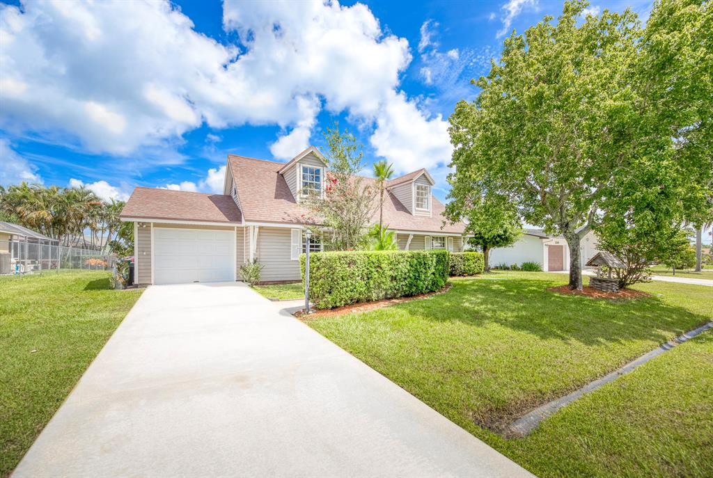 Photo of 395 SE Husted Terrace Ter, Port Saint Lucie, FL 34983 (MLS # R10820296)