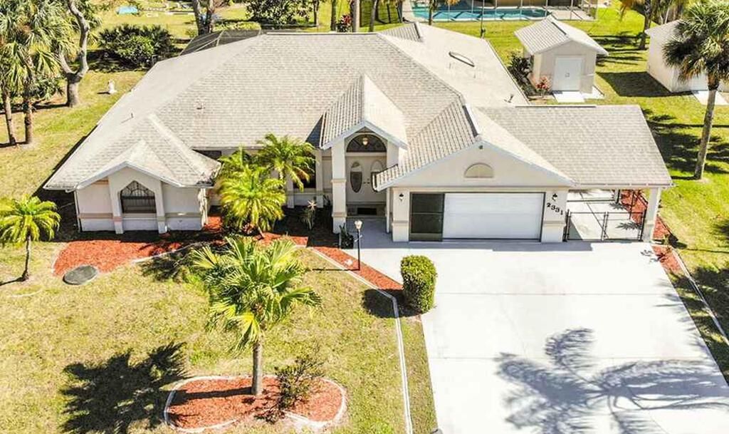 Photo of 2331 SW Blaine Terrace, Port Saint Lucie, FL 34953 (MLS # R10733029)