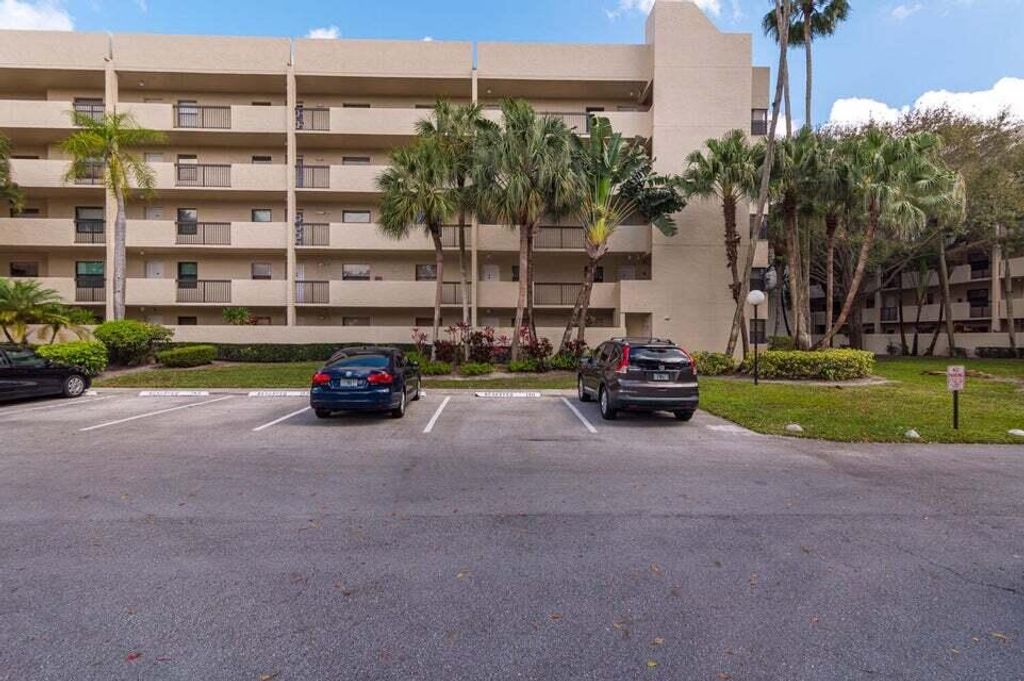 Photo of 3100 NW 42nd Ave #D404, Coconut Creek, FL 33066 (MLS # R11156809)