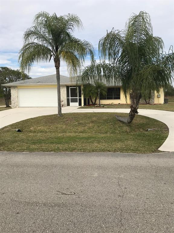 Photo of 399 SW Fairway Avenue, Port Saint Lucie, FL 34983 (MLS # R10739663)