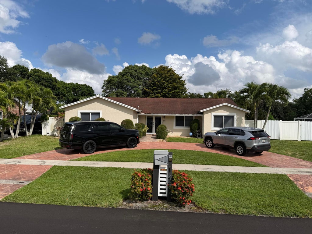 Photo of 147 Alcazar Street, Royal Palm Beach, FL 33411 (MLS # B26037484)