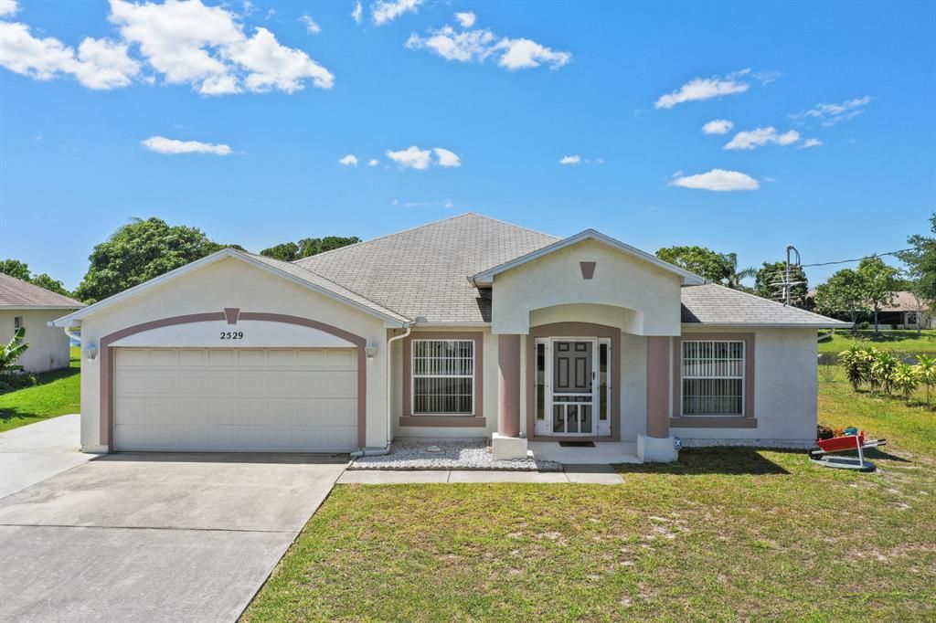 Photo of 2529 SE Lyman Circle, Port St Lucie, FL 34952 (MLS # R10883038)