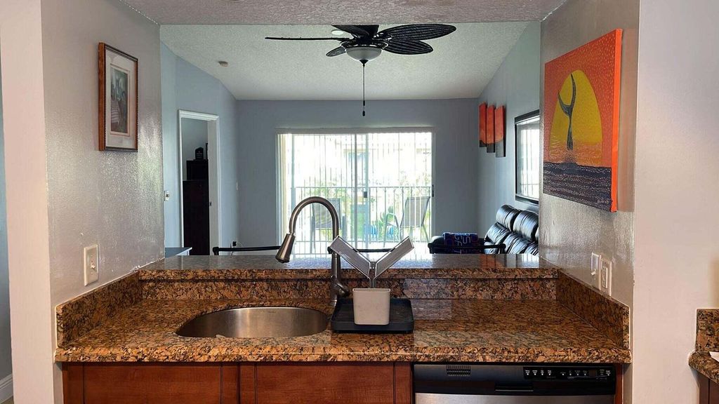Photo of 1035 Lake Shore Drive #203, Lake Park, FL 33403 (MLS # R11015608)